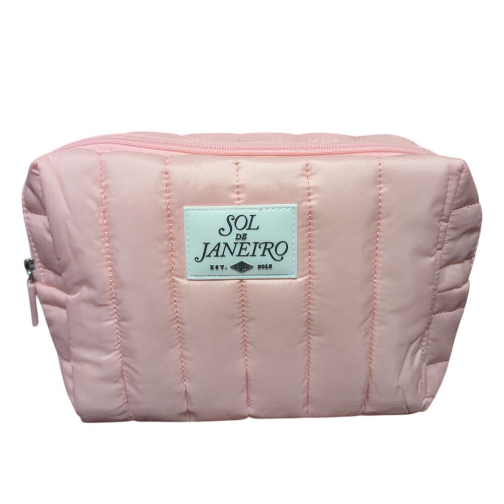 New Sol De Janeiro TSA-approved quilted travel pouch in pink